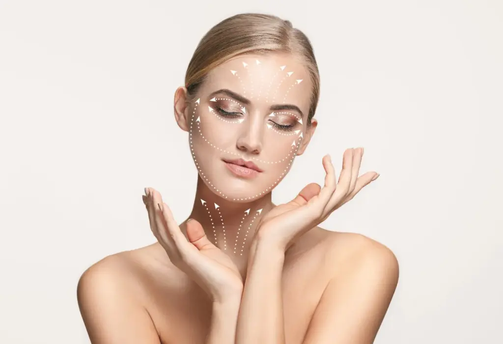 Woman with delicate hand placement under her chin showcasing lifted, firm facial contours.