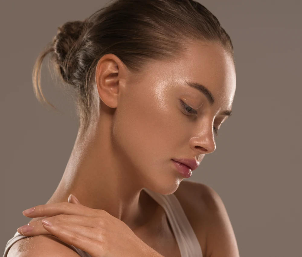 Side profile view of a woman showcasing smooth skin after Potenza RF microneedling treatment