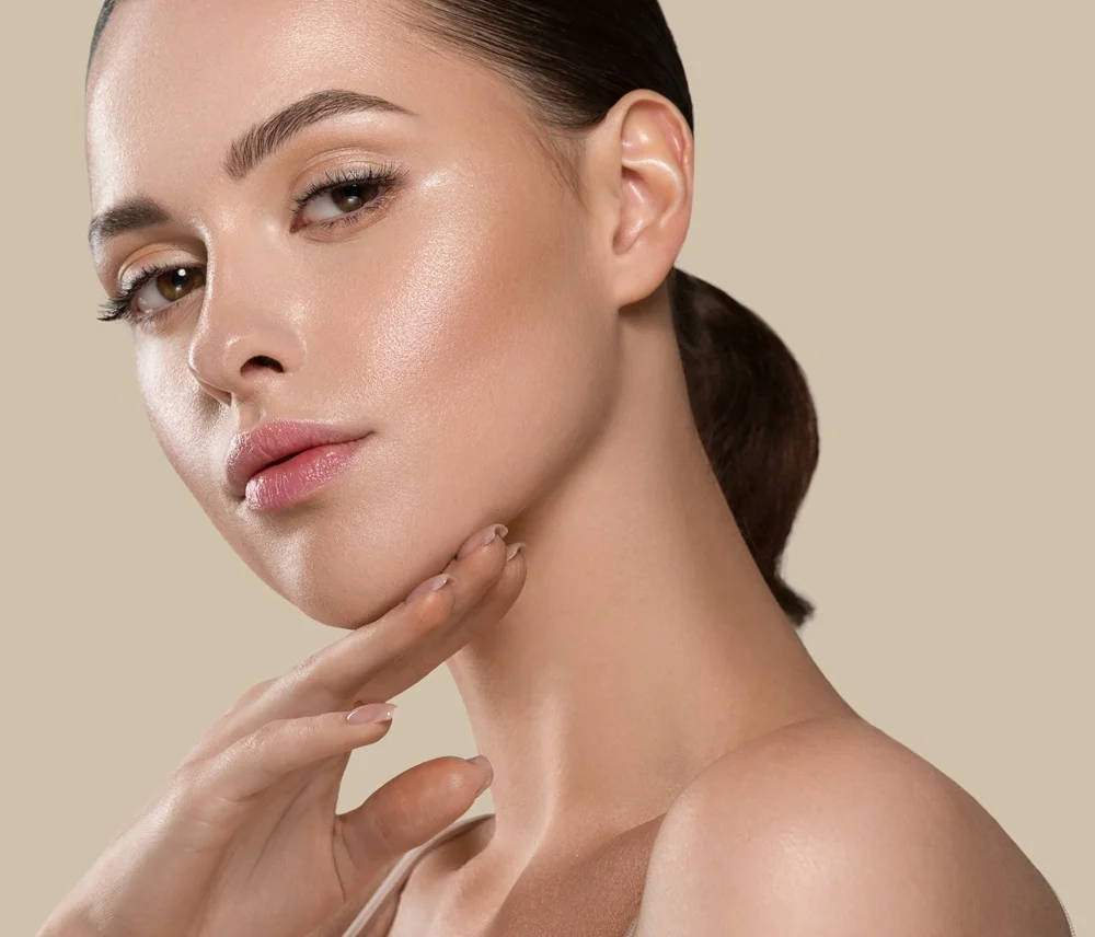 Close-up of a woman's face showcasing smooth forehead and eye area post neurotoxin treatment.