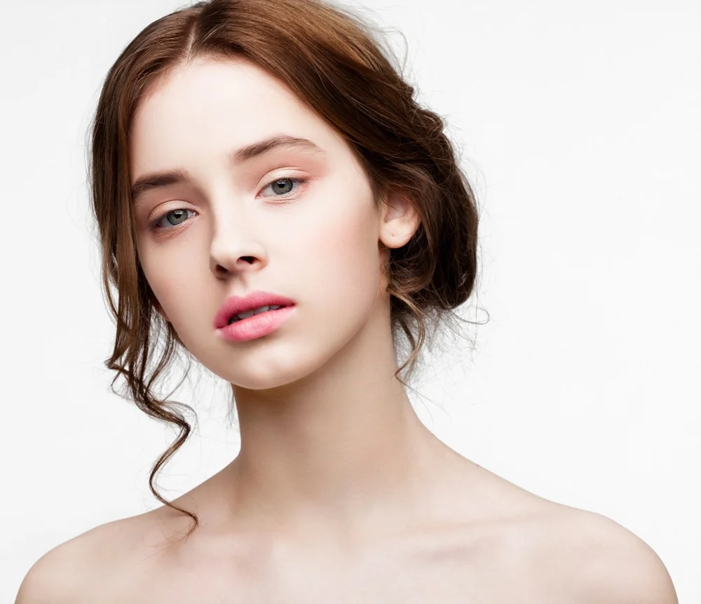 Portrait of a woman with natural facial volume and smooth skin after Restylane filler